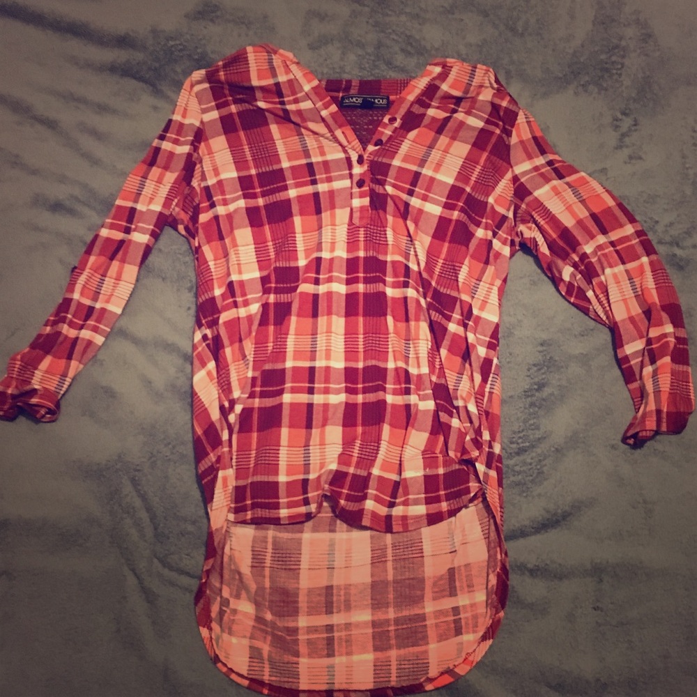 Plaid white and red shirt.